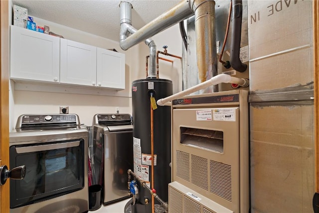 3110 Willowridge Rd Unit D, Marion, IA 52302 - washroom featuring water heater, washing machine and clothes dryer, cabinet space, and a textured ceiling