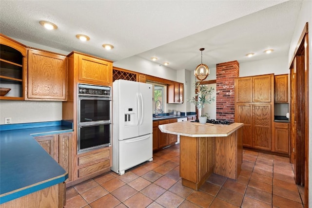 kitchen with white refrigerator with ice dispenser, a center island, open shelves, brown cabinets, and hanging light fixtures