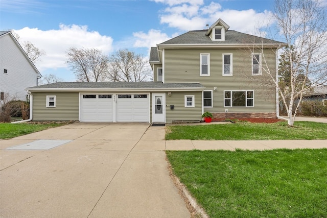 300 SW Palisades Rd, Mount Vernon, IA 52314 - view of front facade with a garage, concrete driveway, and a front yard
