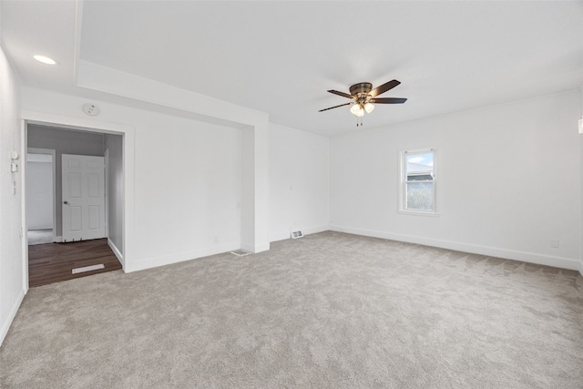 300 SW Palisades Rd, Mount Vernon, IA 52314 - carpeted spare room featuring ceiling fan and baseboards
