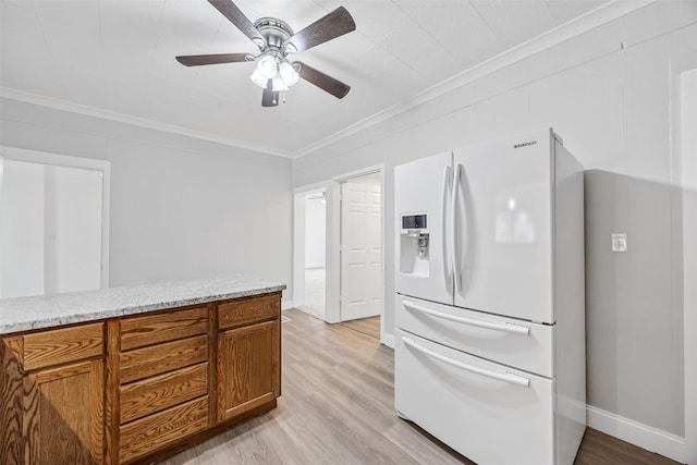300 SW Palisades Rd, Mount Vernon, IA 52314 - kitchen with white refrigerator with ice dispenser, ornamental molding, brown cabinets, light wood finished floors, and a ceiling fan