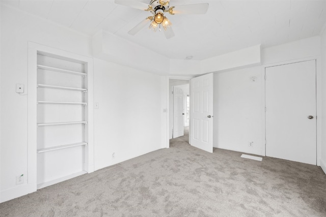 300 SW Palisades Rd, Mount Vernon, IA 52314 - unfurnished bedroom with carpet flooring and a ceiling fan