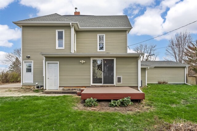 300 SW Palisades Rd, Mount Vernon, IA 52314 - back of house with a wooden deck, a yard, a chimney, and roof with shingles