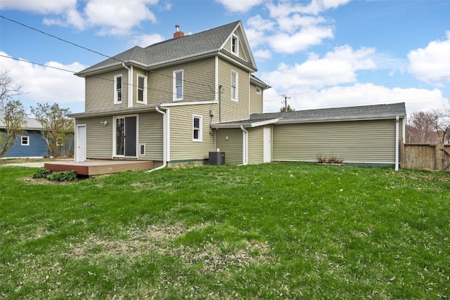 300 SW Palisades Rd, Mount Vernon, IA 52314 - back of house with a deck, central AC unit, and a chimney