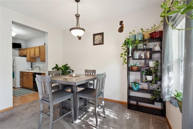 dining room with baseboards