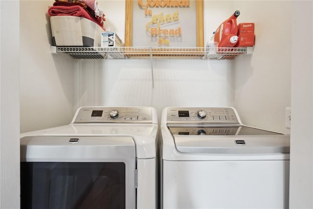 laundry room featuring washer and dryer
