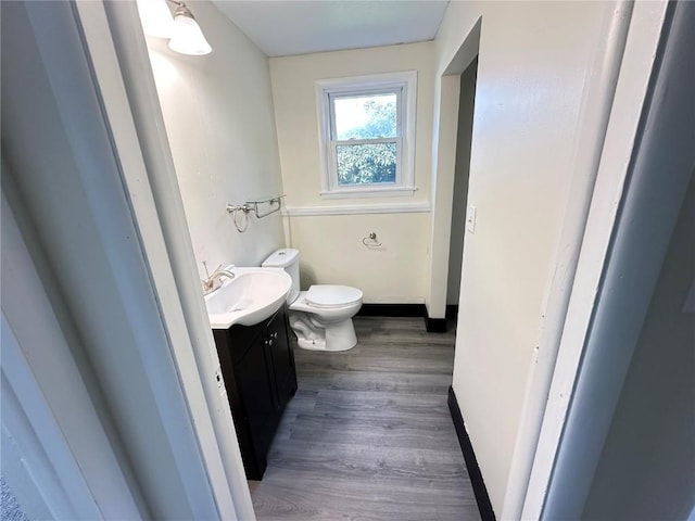 2770 24th Ave, Marion, IA 52302 - bathroom with vanity and wood finished floors
