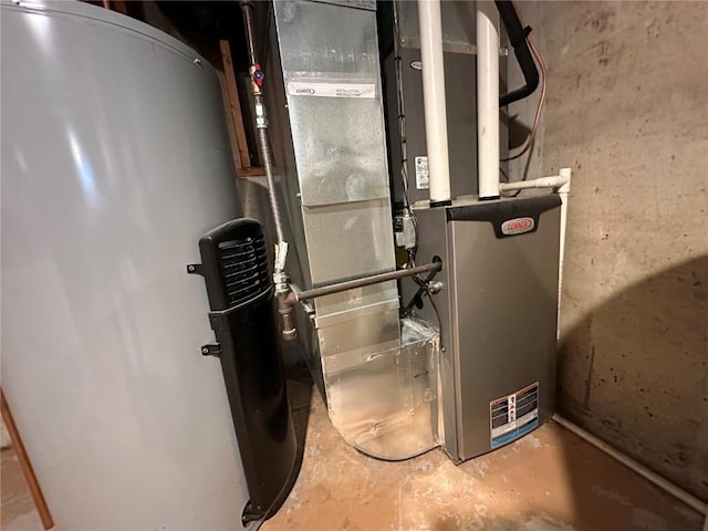 2770 24th Ave, Marion, IA 52302 - utility room featuring water heater and heating unit