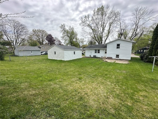 2770 24th Ave, Marion, IA 52302 - back of house featuring a lawn and a patio area