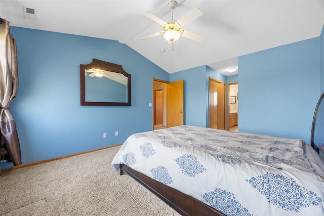 carpeted bedroom featuring lofted ceiling, baseboards, and ceiling fan
