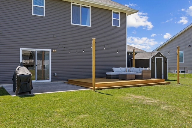 rear view of property with an outdoor living space, a storage unit, a patio, and an outdoor structure