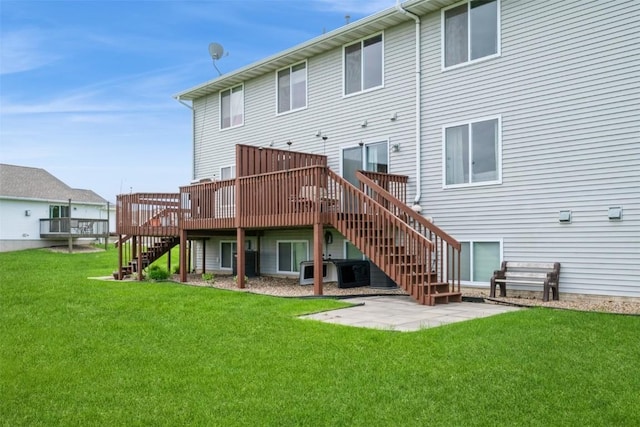 back of house with stairs, a wooden deck, a patio, a lawn, and cooling unit