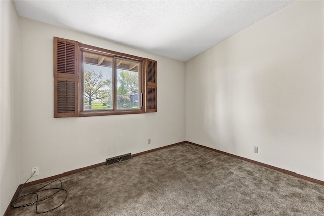 3729 Wenig Rd NE, Cedar Rapids, IA 52402 - carpeted empty room featuring baseboards and a textured ceiling
