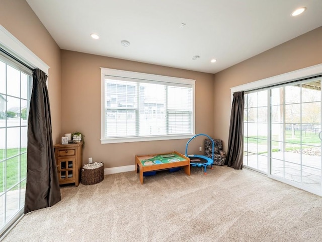 rec room with carpet floors, baseboards, and recessed lighting
