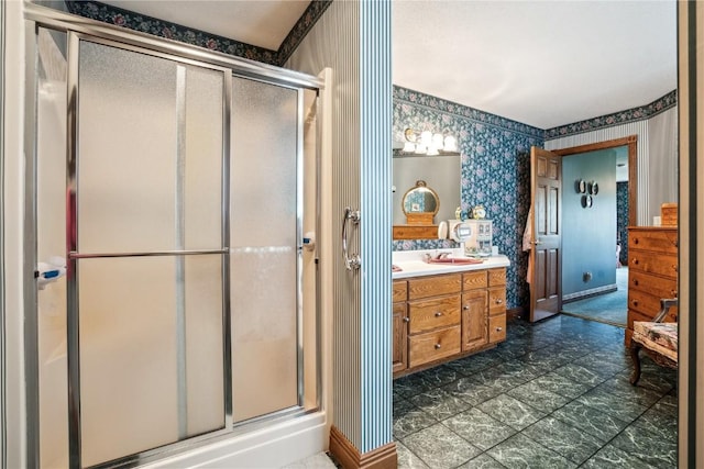 4030 Bruce Rd, Marion, IA 52302 - bathroom with wallpapered walls, vanity, and a stall shower