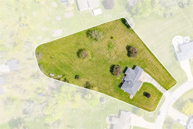 aerial view of property and surrounding area featuring property boundaries highlighted