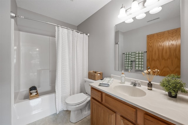 full bathroom featuring toilet, shower / bath combination with curtain, vanity, and tile patterned flooring