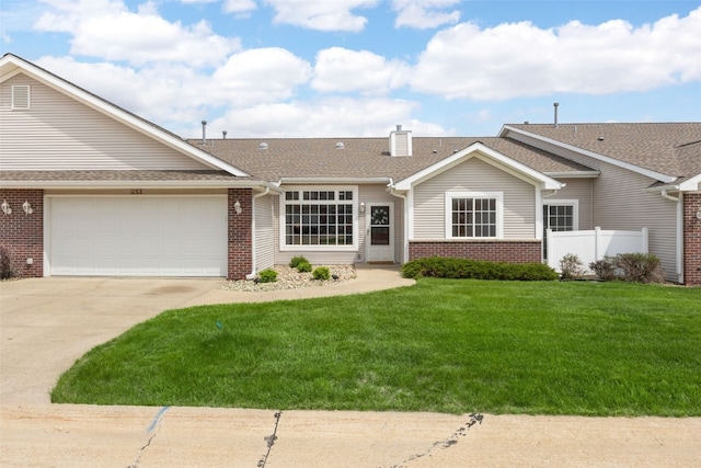 single story home featuring brick siding, concrete driveway, a garage, and a chimney