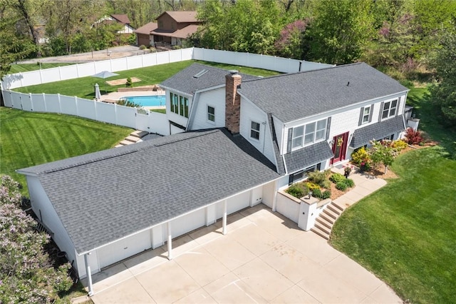view from above of property featuring a pool