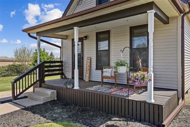 entrance to property with covered porch