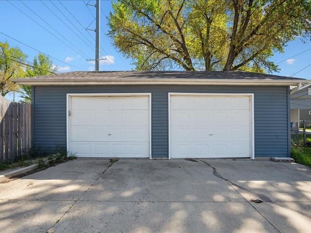 detached garage with fence