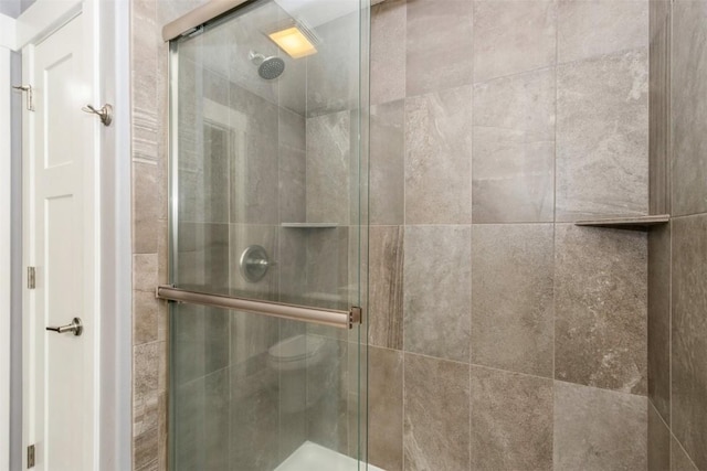 full bathroom with a stall shower