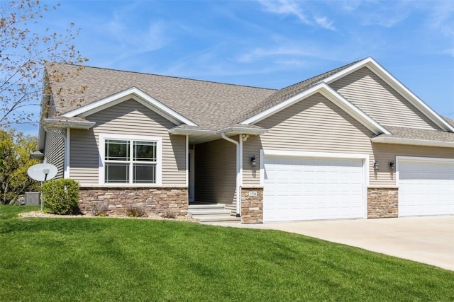 view of front of property featuring a garage, concrete driveway, stone siding, and a front yard