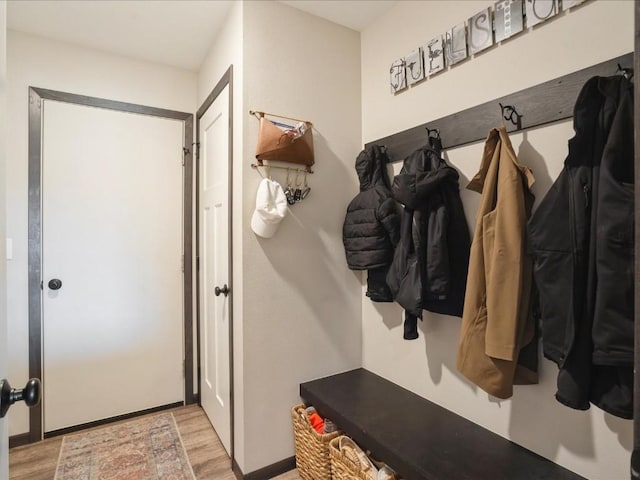 420 Dawson Dr, West Branch, IA 52358 - mudroom featuring wood finished floors and baseboards