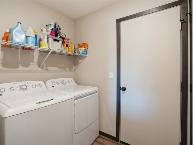 clothes washing area with washer and dryer
