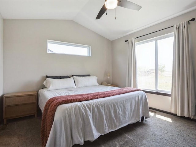 bedroom featuring carpet flooring, lofted ceiling, and ceiling fan