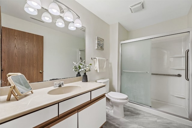 4619 1st Ave SW Unit 3, Cedar Rapids, IA 52404 - full bathroom featuring a stall shower, vanity, marble look tile flooring, and toilet