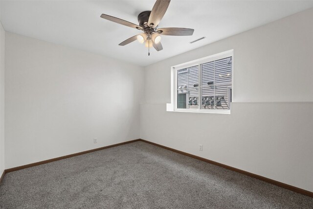4619 1st Ave SW Unit 3, Cedar Rapids, IA 52404 - empty room with ceiling fan, carpet floors, and baseboards