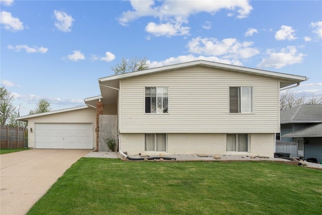 split level home featuring brick siding, concrete driveway, and a garage
