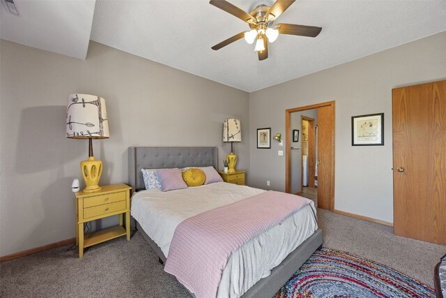 250 Cimarron Dr Unit 207, Hiawatha, IA 52233 - bedroom featuring carpet, baseboards, and a ceiling fan