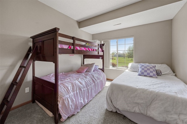 250 Cimarron Dr Unit 207, Hiawatha, IA 52233 - bedroom featuring carpet and baseboards