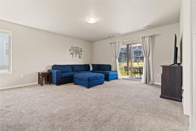 1227 Mary Ln, North Liberty, IA 52317 - carpeted living room with baseboards
