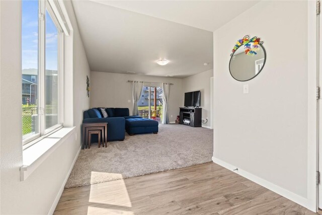 1227 Mary Ln, North Liberty, IA 52317 - living area featuring baseboards and wood finished floors