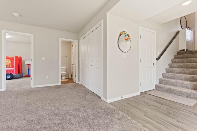 1227 Mary Ln, North Liberty, IA 52317 - entrance foyer with baseboards and stairway