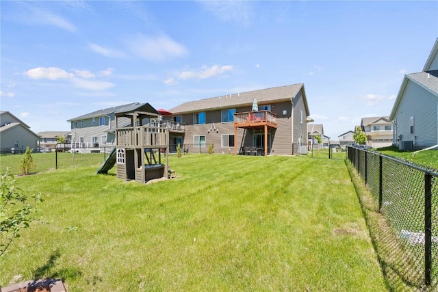 1227 Mary Ln, North Liberty, IA 52317 - back of house with a playground, a residential view, and central AC unit