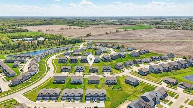 1227 Mary Ln, North Liberty, IA 52317 - aerial view of residential area with a large body of water