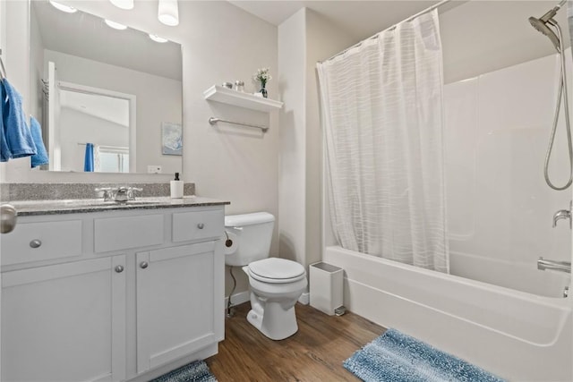 1227 Mary Ln, North Liberty, IA 52317 - full bath featuring wood finished floors, shower / tub combo with curtain, toilet, vanity, and baseboards