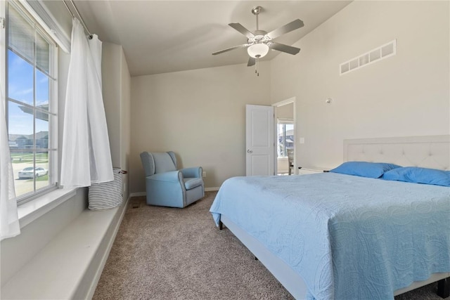 1227 Mary Ln, North Liberty, IA 52317 - carpeted bedroom with baseboards, a ceiling fan, and vaulted ceiling