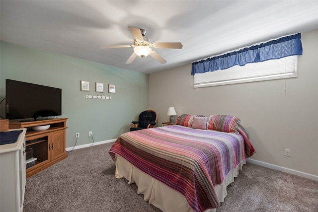 carpeted bedroom with baseboards and ceiling fan