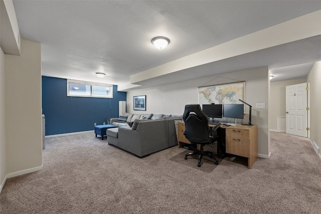 office area featuring carpet and baseboards