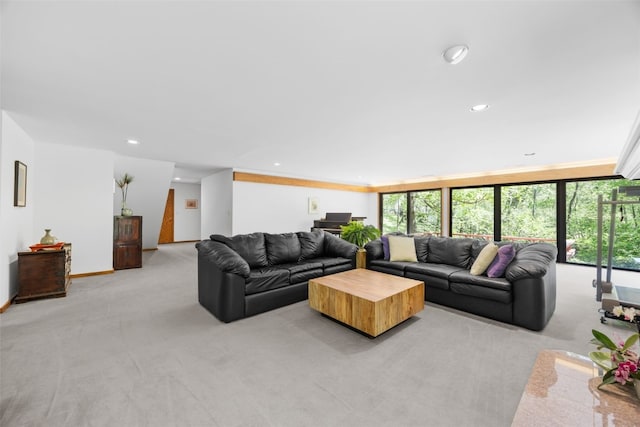 13 Woodland Hts, Iowa City, IA 52240 - living area featuring light colored carpet, plenty of natural light, and recessed lighting