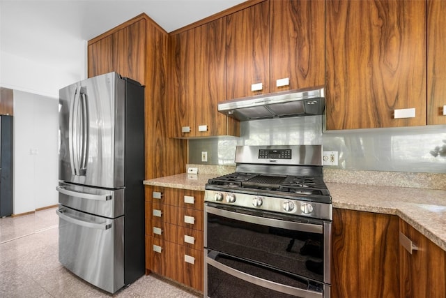 13 Woodland Hts, Iowa City, IA 52240 - kitchen featuring appliances with stainless steel finishes, under cabinet range hood, brown cabinets, and backsplash