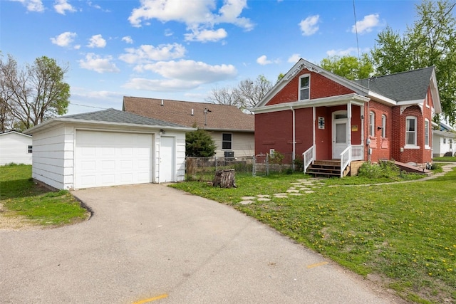 view of front of property with a garage, brick siding, driveway, an outdoor structure, and roof with shingles