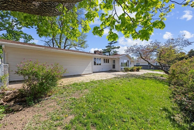 rear view of house featuring a patio area