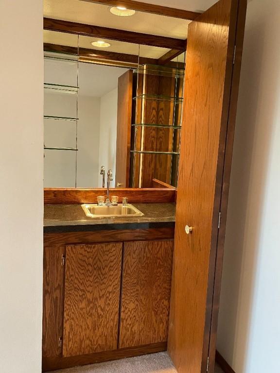 bathroom featuring vanity and recessed lighting