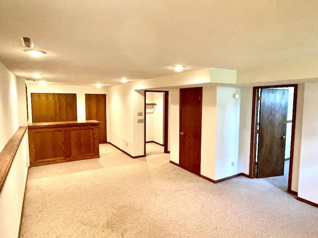 1721 Hidden Hollow Ln, Cedar Rapids, IA 52405 - unfurnished room with light carpet and baseboards